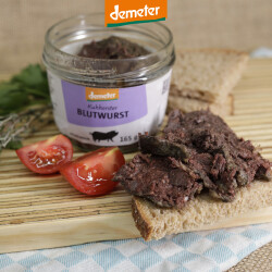 Holzbrett mit Kuhhorster Leberwurst im Glas, Tomanten und...